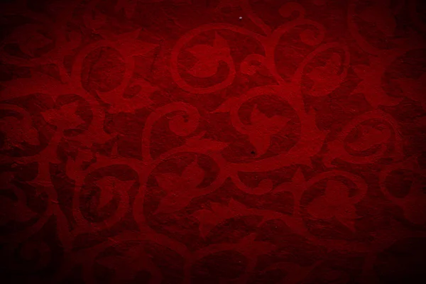 Papier de couleur antique texture de fond avec sombre dans le vieux design vintage en détresse. Couleur du papier rouge, texture de Noël — Photo