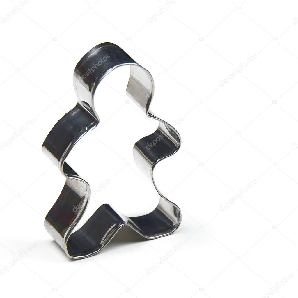 gingerbread cookie cutter. stainless steel molds for baking christmas cookies. man isolated on white with copy space