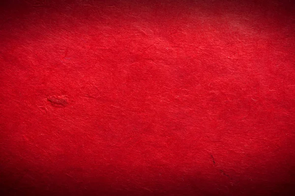 Papier de couleur antique texture de fond avec sombre dans le vieux design vintage en détresse. Couleur du papier rouge, texture de Noël — Photo
