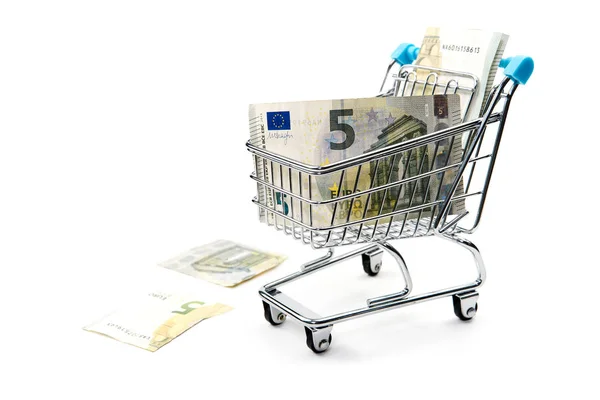 Carrello della spesa con banconote in euro isolate su bianco. shopping, prestito, risparmio di denaro, pensione, concetto di investimento — Foto Stock