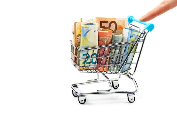 Grocery cart with euro bills with hand. Isolated on white. shopping, loan, money saving, pension, investments concept — 스톡 사진