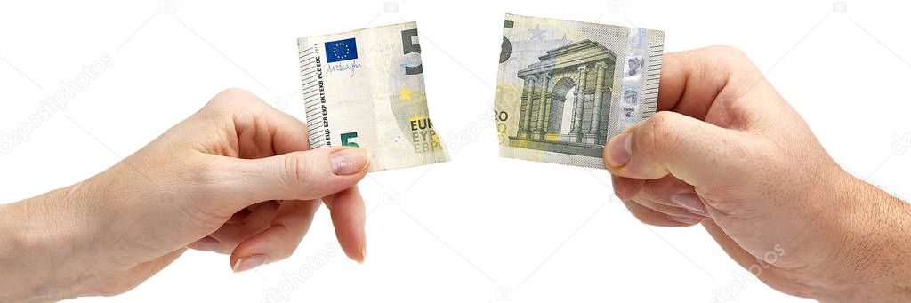 man hand whith euro bills, isolated on white. euro banknote torn bills in half