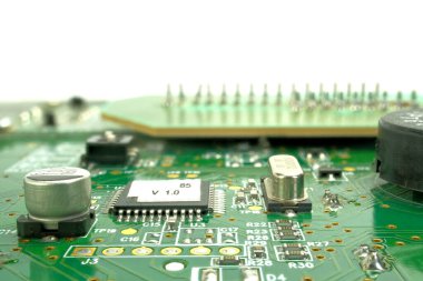 Electronic board can be used as background . Close up of a printed green computer circuit board
