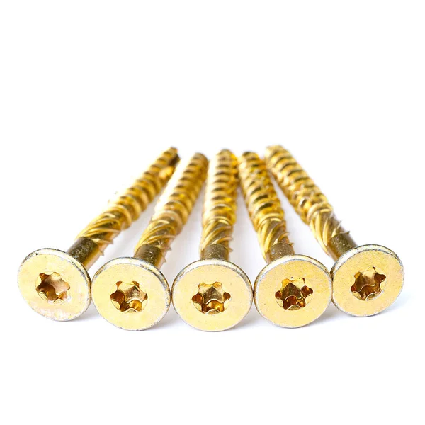 Gold torx screw isolated on white. Yellow zinc chipboard screw Torx, , full thread close up — 스톡 사진