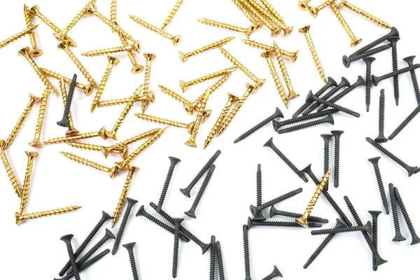 Background from yellow zinc screws. Torx screw on white background — Stock Photo, Image