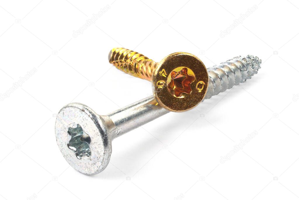 Gold torx screw isolated on white. Yellow zinc chipboard screw Torx, , full thread close up