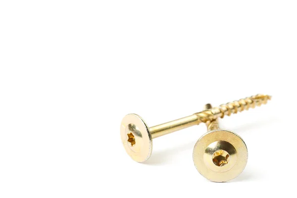 Gold torx screw isolated on white. Yellow zinc chipboard screw Torx, , full thread close up — Stockfoto
