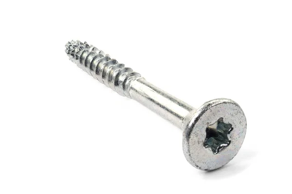 Torx tornillos sobre fondo blanco de cerca. Tornillos de plata para madera, aglomerado o contrachapado con cabeza de torx . — Foto de Stock