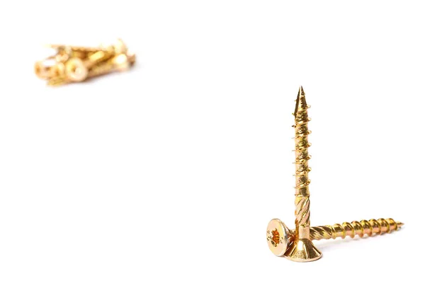 Gold torx screw isolated on white. Yellow zinc chipboard screw Torx, , full thread close up — Stock Photo, Image