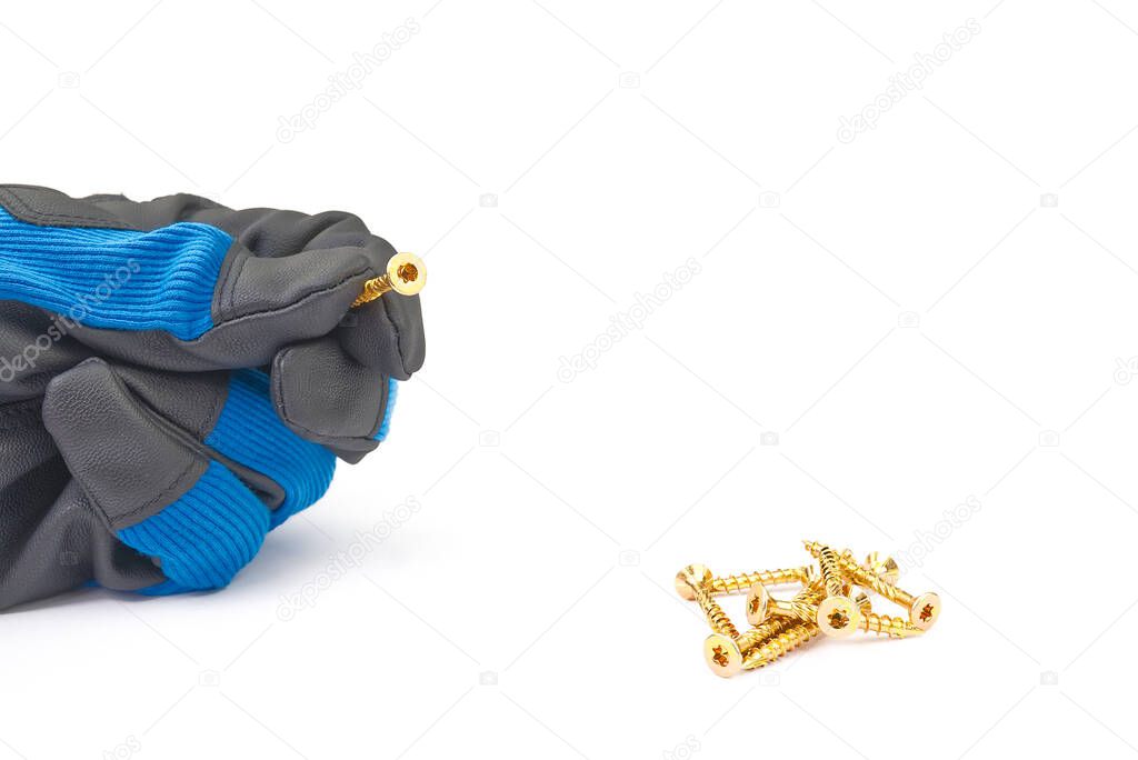 Men hand in glove holding yellow zinc torx screw, isolated on white