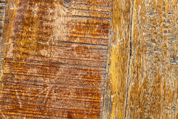 Textura de madeira marrom de mesa de madeira velha com muitos arranhões e marcas de uso — Fotografia de Stock