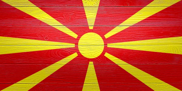 North Macedonia flagga målad på gamla trä planka bakgrund. Borstad naturlig ljus trästruktur. Trä struktur bakgrund flagga norra Makedonien. — Stockfoto