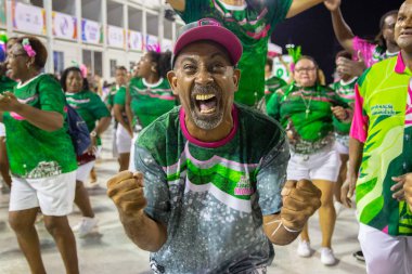 member of the samba school mangueira in Rio de Janeiro, Brazil - February 16, 2020: member of the samba school Mangueira during rehearsal in Rio de Janeiro.