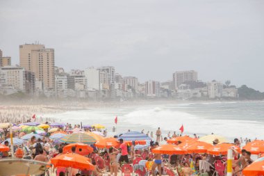 Leblon beach in Rio de Janeiro, Brazil - February 24, 2020: Leblon beach full during the third day of carnival in Rio de Janeiro.