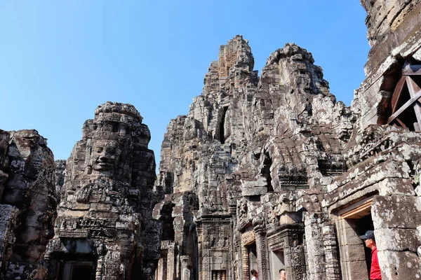 Views of temples and ancient buildings in Cambodia surrounded by rainforest