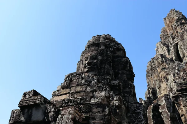 Views of temples and ancient buildings in Cambodia surrounded by rainforest