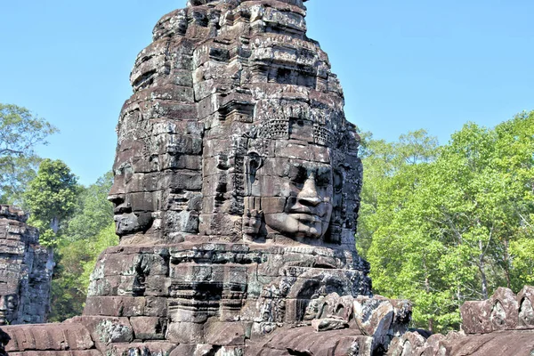 Views of temples and ancient buildings in Cambodia surrounded by rainforest