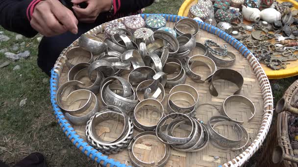 Close view of jewellery and bijouterie at Namche Bazaar street market,Pokhara,Nepal. — Stock Video