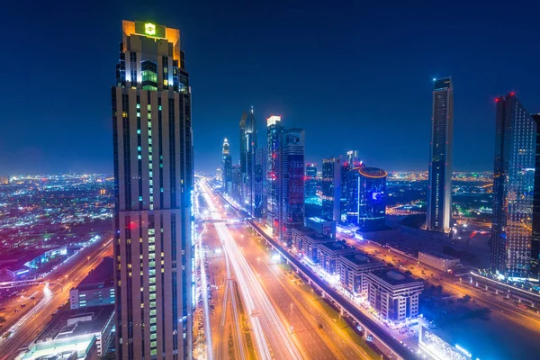 Dubai Nacht Stadt Und Skyline Nach Sonnenuntergang lizenzfreie Stockfotos