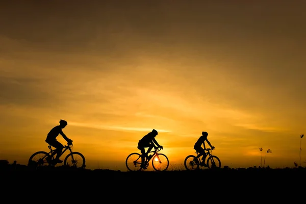 Silhouette of cycling on sunset background — Stock Photo, Image