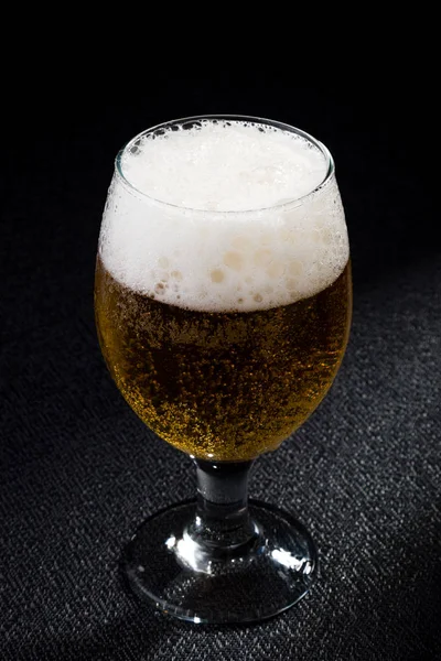 Beer on black — Stock Photo, Image