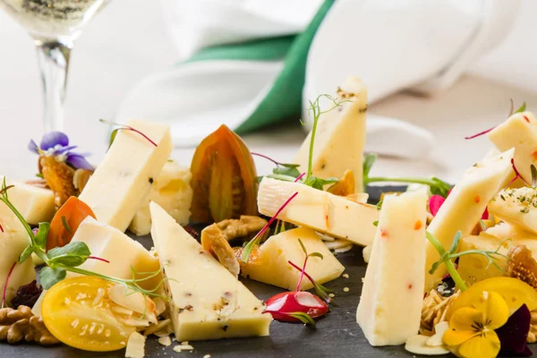 Platter with different types of cheese — Stock Photo, Image