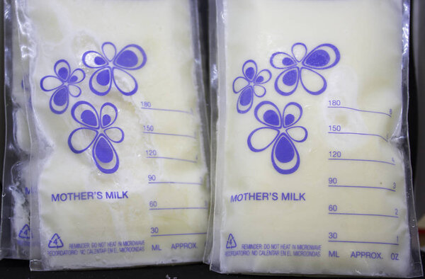 Pumped frozen breastmilk for feeding baby