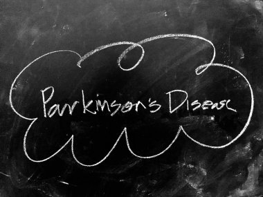 Parkinson hastalığı yazı tahtası üzerinde el yazısı