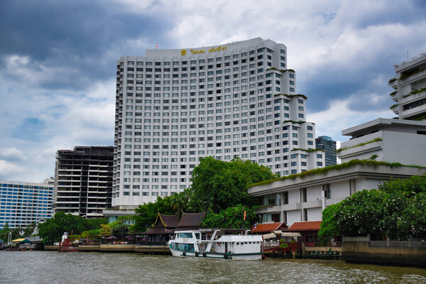 View of the main building of the luxury and exclusive Shangri-La Hotel along the Chao Phraya River
