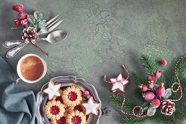 Flat lay with Xmas decorations in green and red with frosted ber — Stock Photo, Image