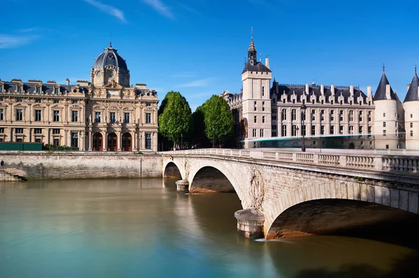 The Pont au Change connecting island Ile de la Cite with the Right Bank. Building on the left is Registry of the Paris Commercial Court, on the right - Conciergerie fortress.