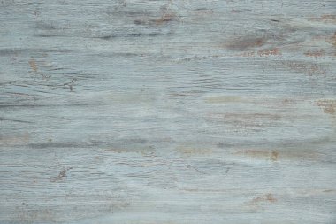 Açık gri-mavi ahşap desenli ve çatırdayan boyalı. Yaşlanmış tahta yüzeyi, kopyalama alanı ile yüksek çözünürlüklü resim