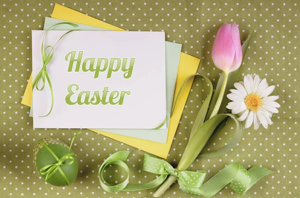 Easter greeting card with flowers, egg and ribbons — Stockfoto