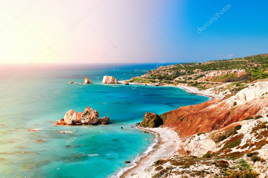 Seashore and pebble beach with wild coastline in Cyprus island, Greece by Petra tou Romiou landmark