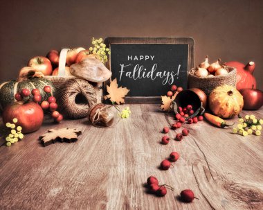 Autumn arrangement with apples, pumpkins, onions, peppers and de