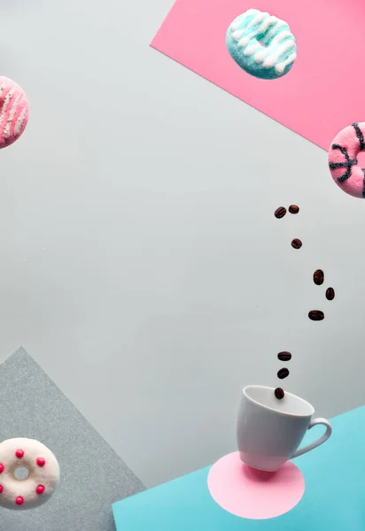 St. Valentine concept, levitation of doughnuts. Coffee beans fly in espresso cup, fake fur. Creative surreal food and drink background in pink, blue mint and grey colors with copy-space, text place.. — 图库照片