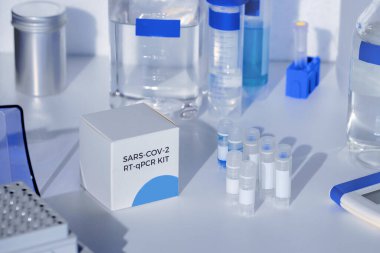 SARS-COV-2 pcr diagnostics kit. This is RT-PCR kit to detect presence of 2019-nCoV virus causing Covid-19 disease presence in clinical specimens. clipart