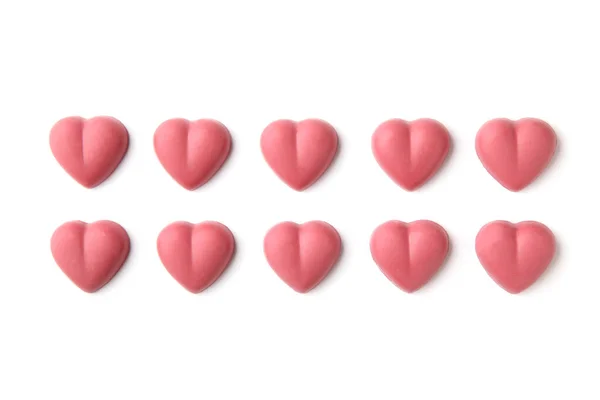 Corazón en forma de rubí rosa chocolate aislado sobre fondo blanco —  Fotos de Stock