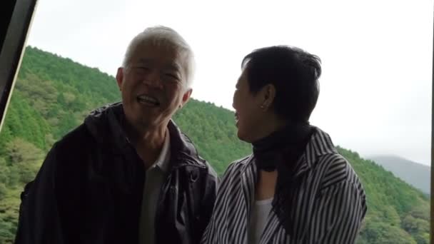 Senior couple cruising on ship during retirement vacation — Stock Video