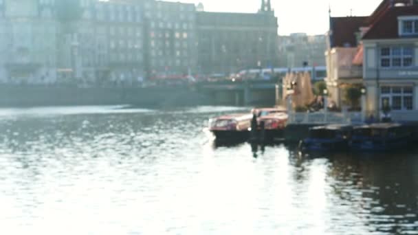 Blur royalties shot of morning sun at Amsterdam canal bay in front of main station — Stock Video