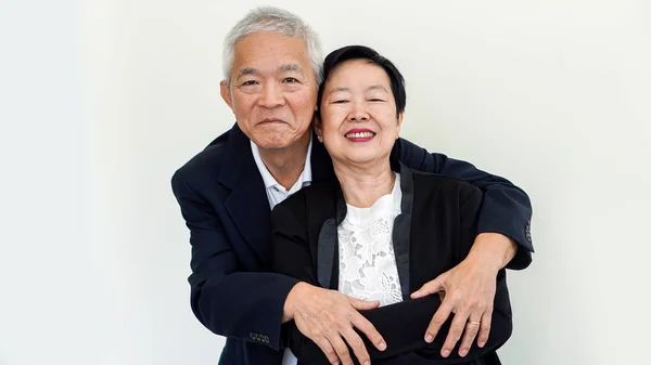 Glückliches asiatisches Seniorenpaar. Erfolg in Geschäft und Leben, gemeinsam — Stockfoto