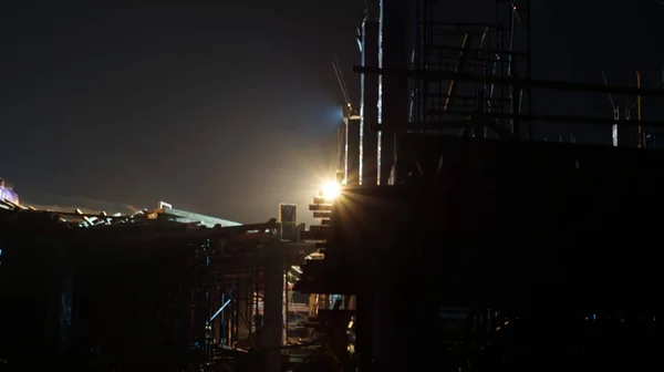 Construction at night structure with light building — Stock Photo, Image