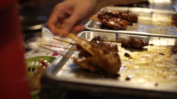 Hand Picking Moo Ping Thai Pork Skewer Bbq Night — Stock Video