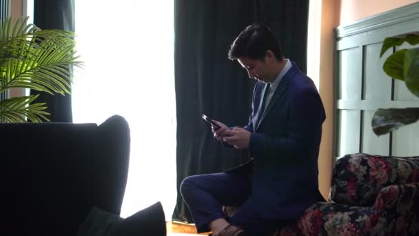 Asian Businessman Blue Suit Working Smartphone Home Alone — Stock Video