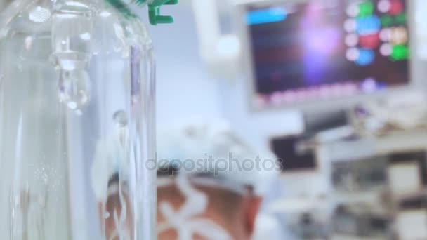 Drip with ECG monitor in operation room. — Stock Video