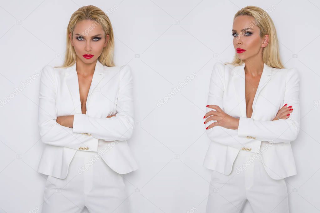 Elegant businesswomen in white jacket and red lips standing on a white background