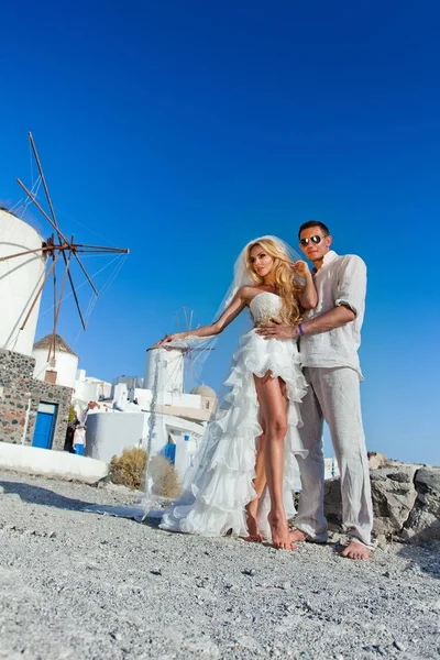 Yakışıklı adam güzel Yunan yatay olarak ilgili güzel kadın güzel genç Çift