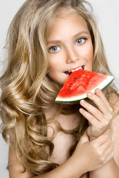 Beautiful Blonde Young Model Cute Girl Holding Armelon Looking Cute — стоковое фото