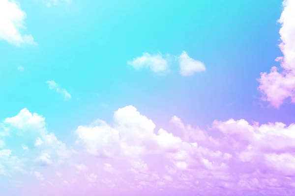 Colorful pink and green sky with clouds background.