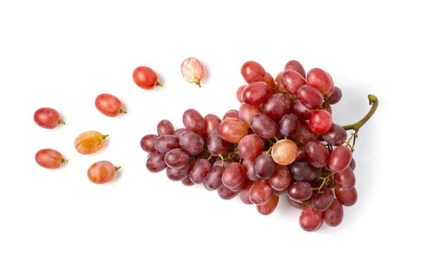 Frische rote Trauben isoliert auf weißem Hintergrund Draufsicht. — Stockfoto